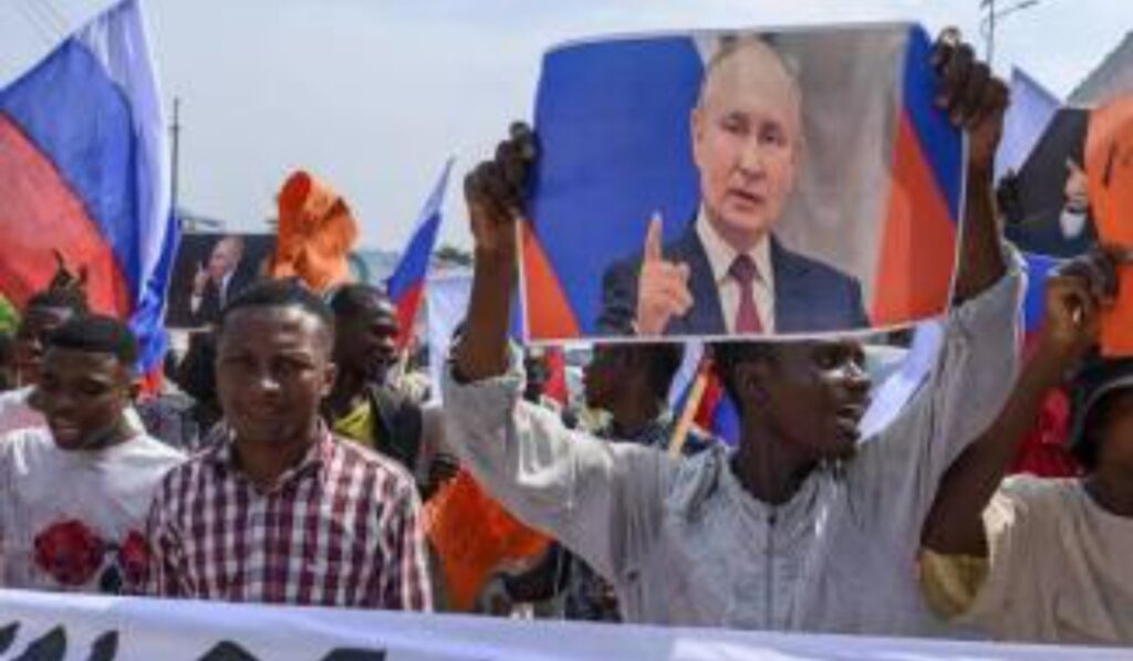 Tension As #Endbadgovernance Protesters Wave Russian Flags Seek President Putin's Intervention As Many Feared Dead In Police Clash