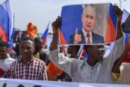 Tension As #Endbadgovernance Protesters Wave Russian Flags Seek President Putin's Intervention As Many Feared Dead In Police Clash