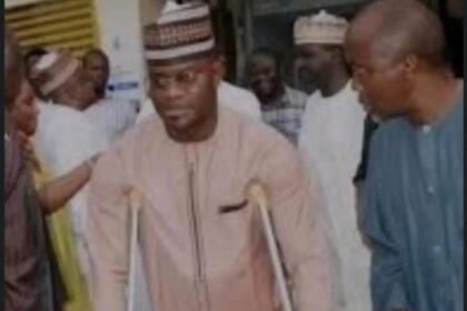 Yahaya Bello in crutches