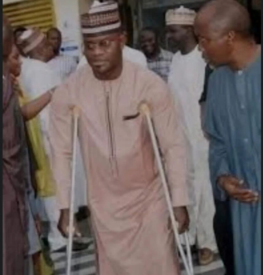 Yahaya Bello in crutches